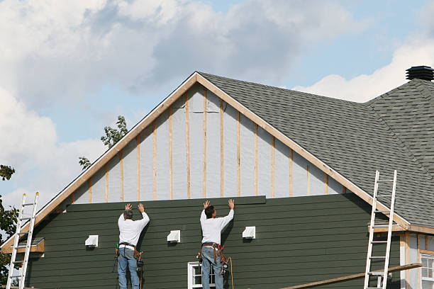 Professional Siding technician working in Mill Run, PA